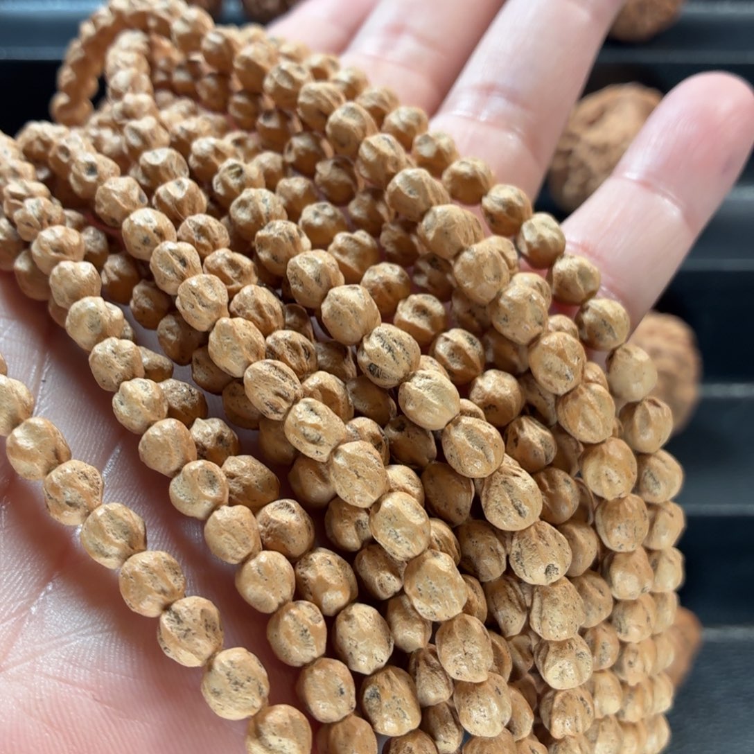 桃核把件深坑鬼脸百香籽108