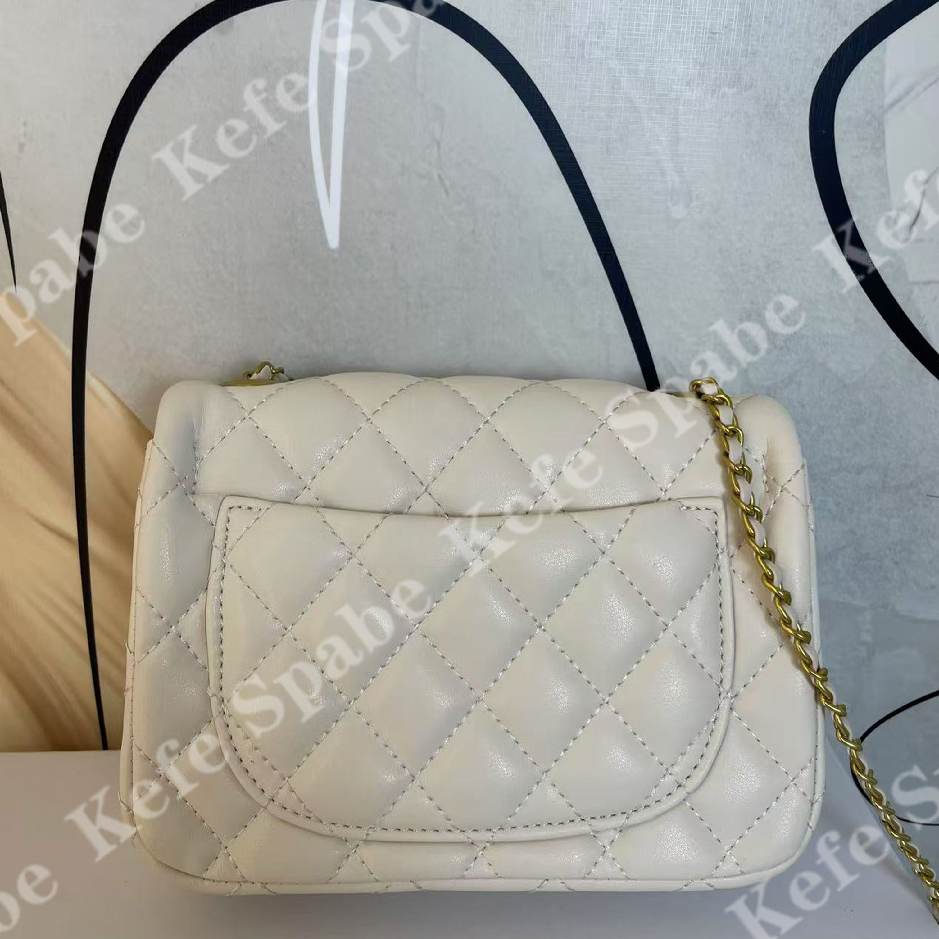 XY009  Y2025新款白色金球方胖子链条斜挎单肩包-1