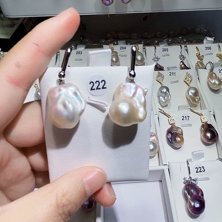 淡水珍珠耳饰银S925镶嵌奔***?