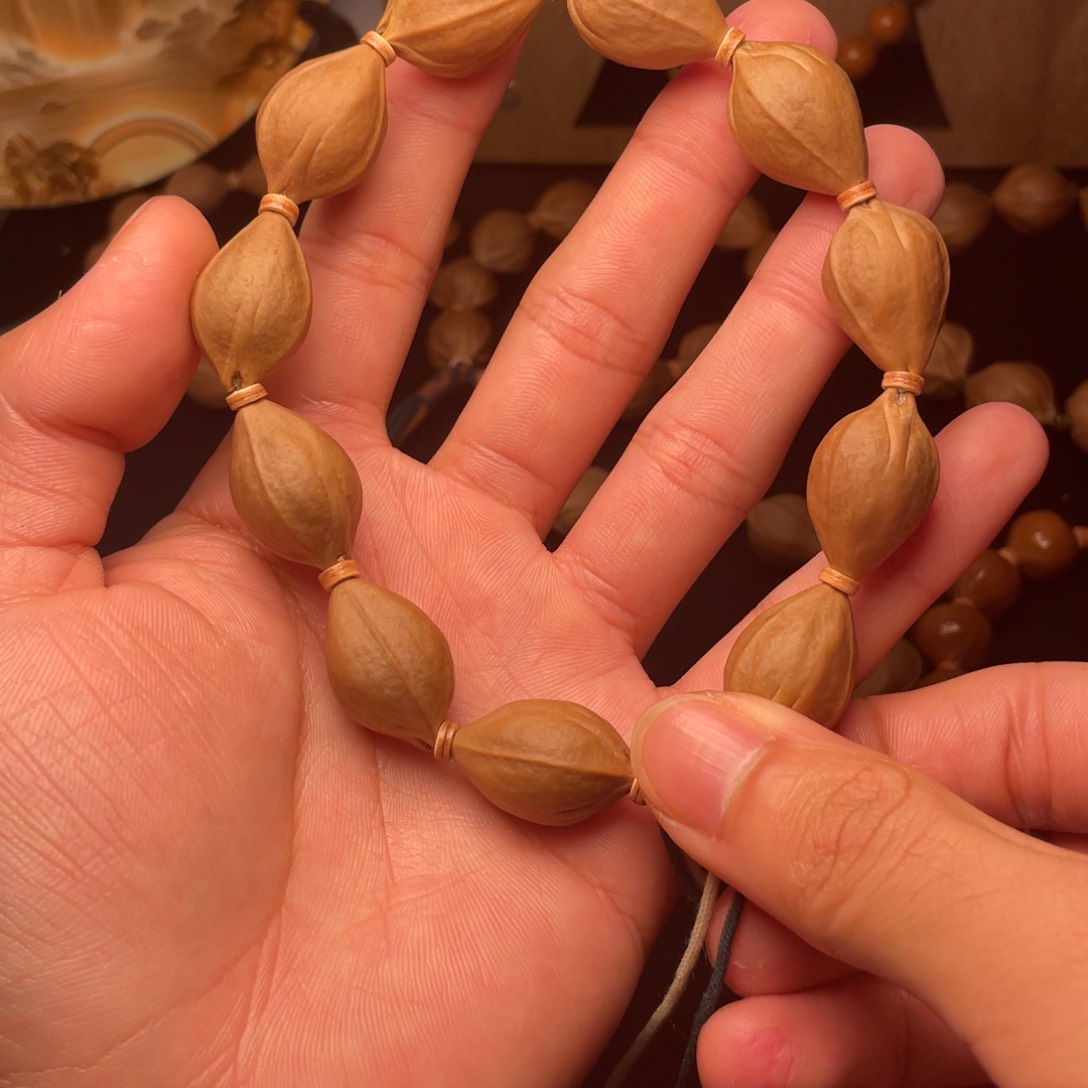 吊坠橄榄核岛*。梅林铁核三面佛