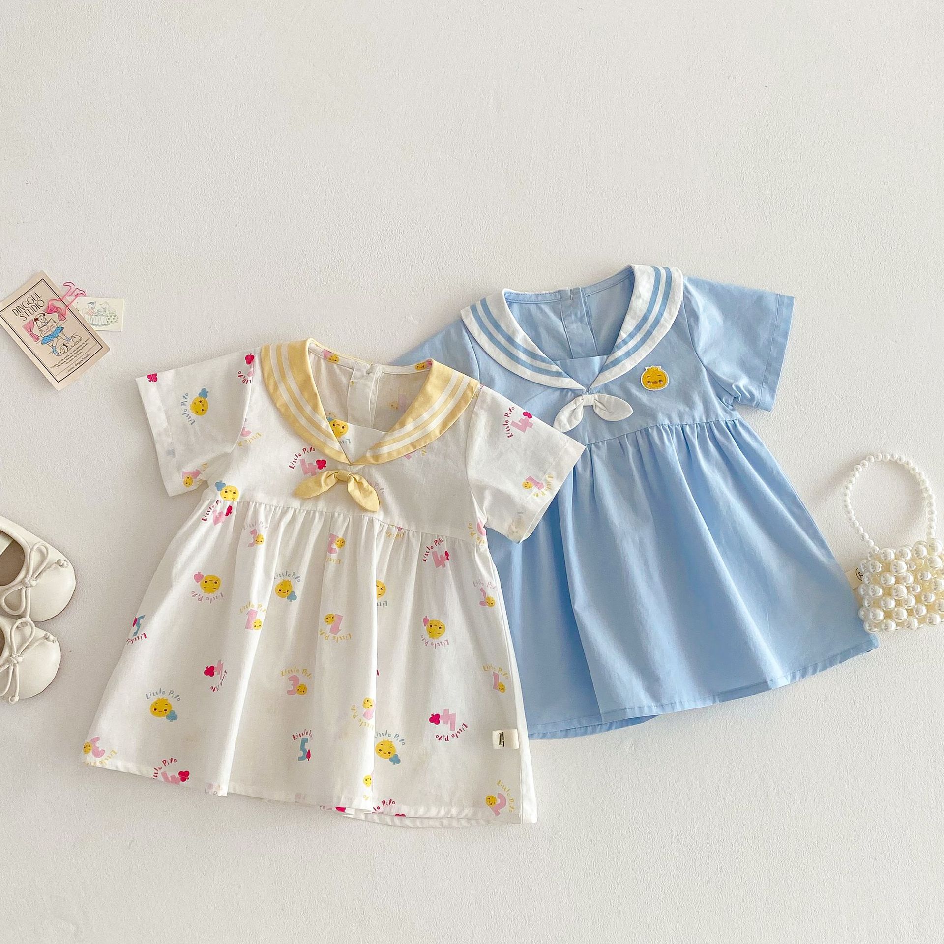 女童小鸭连衣裙2025新款夏季儿童可爱海军风宝宝公仔满版卡通裙子