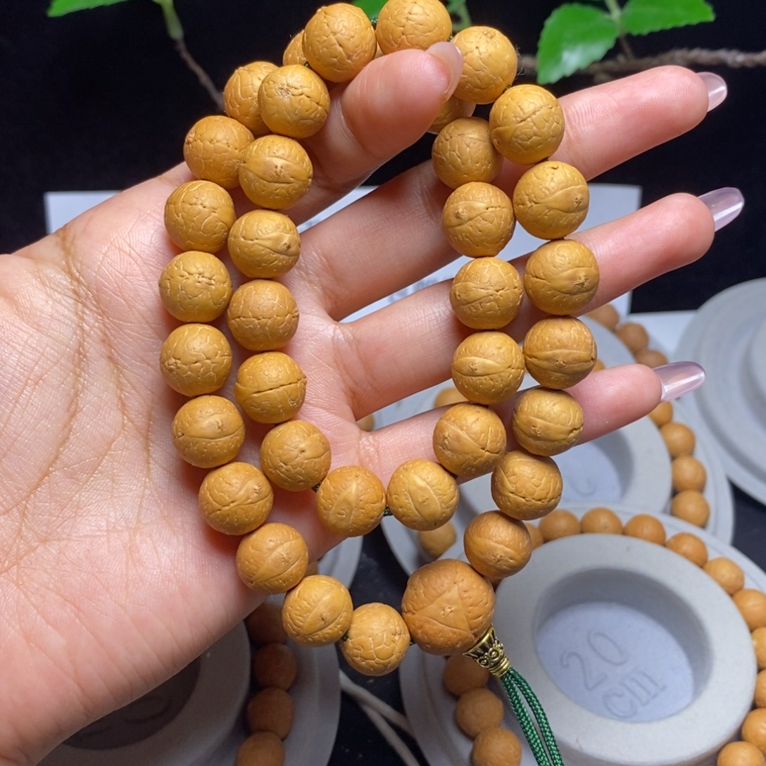 忠***吊坠凤眼菩提手持