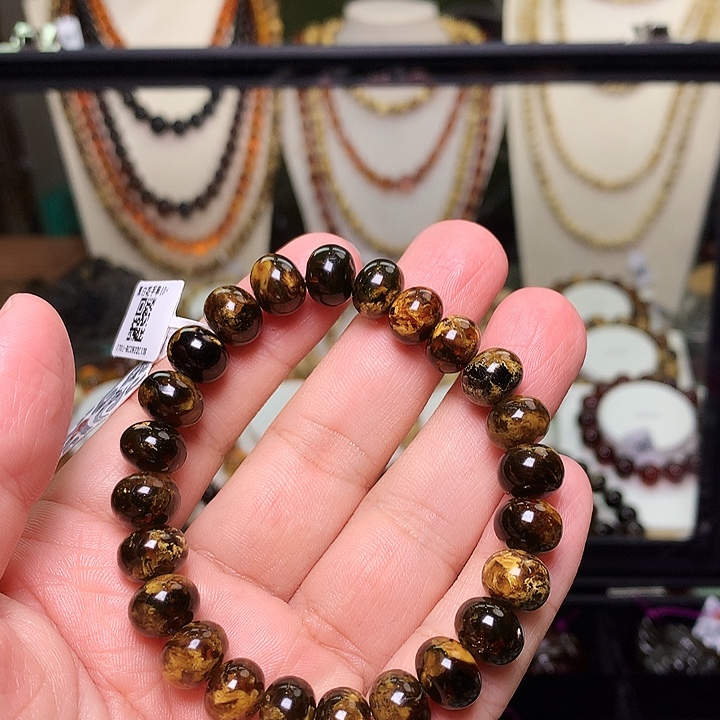 木***、琥珀未镶嵌裸石10+黑金701