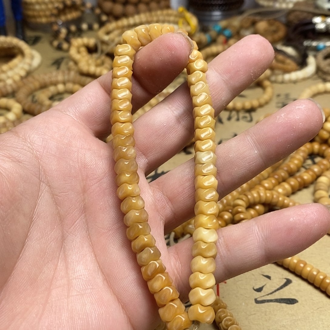 菩提根/象牙果把件泗****赛龙脊菩提龙骨手持