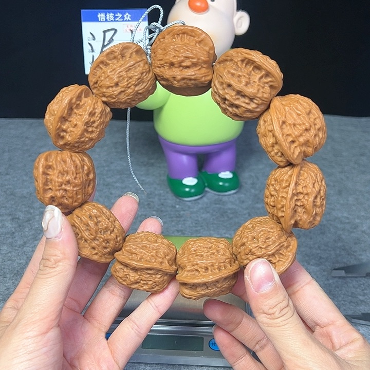 文玩核桃把件崔凯手持