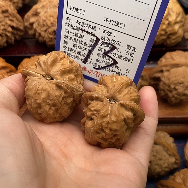 二***甘桃核吊坠元宝狮子头40