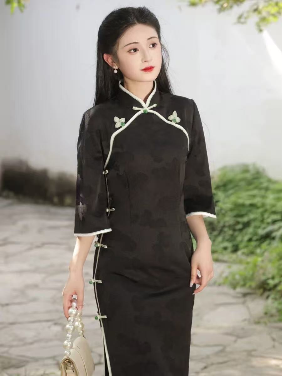 新中式年轻款少女高级感长款黑色旗袍2025年秋季新款显瘦