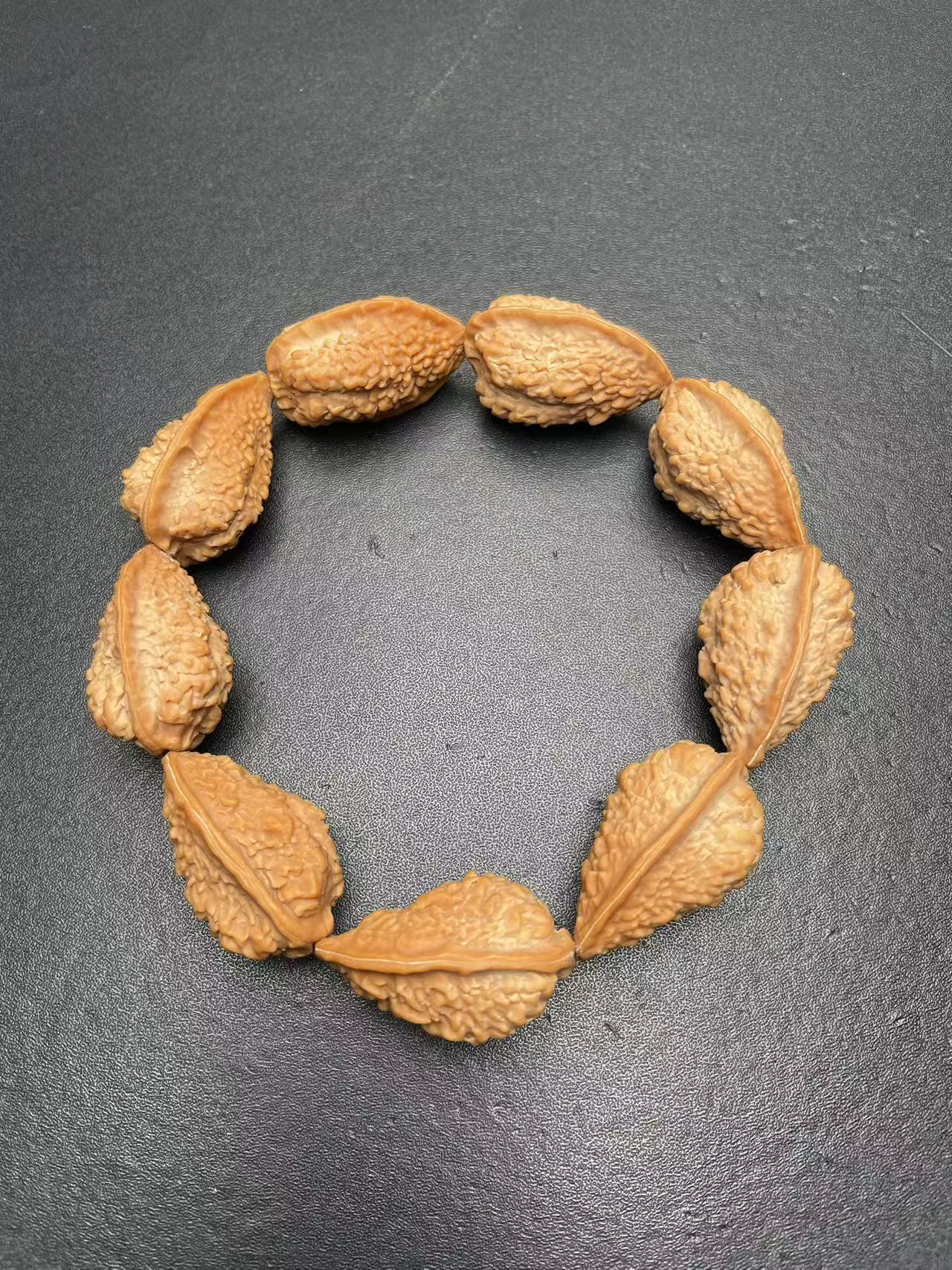 龙鳞纹绣花鞋异型秋子精品手串