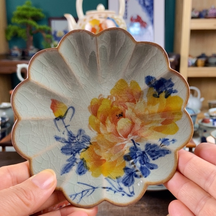 瓷片手工制作工艺精湛等特点为