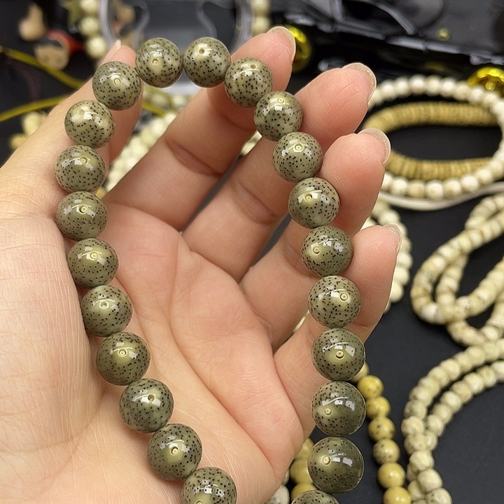 星月菩提吊坠10圆手持 星点货