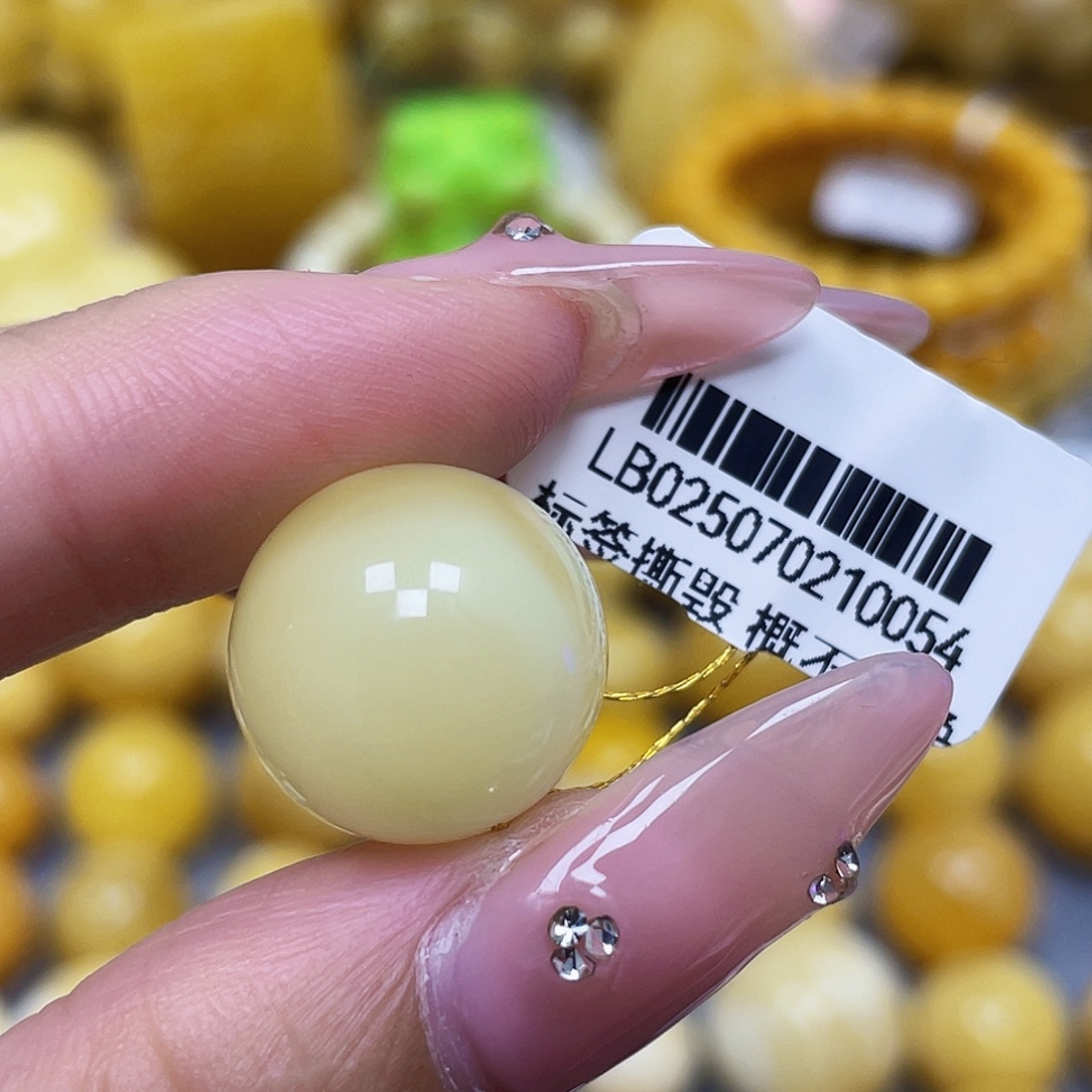 蜜蜡未镶嵌裸石15.6mm瑕