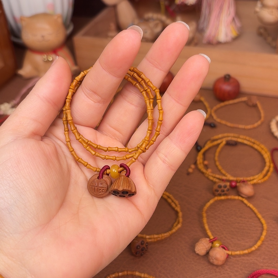 桃核吊坠竹节手串，好运连连，三圈