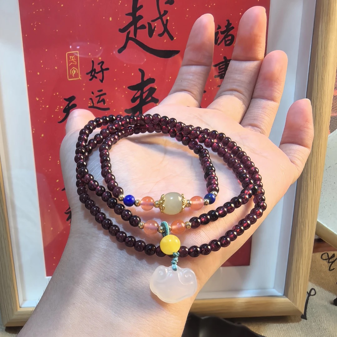 普陀山《九紫离火》子牙乌石榴石三圈手串