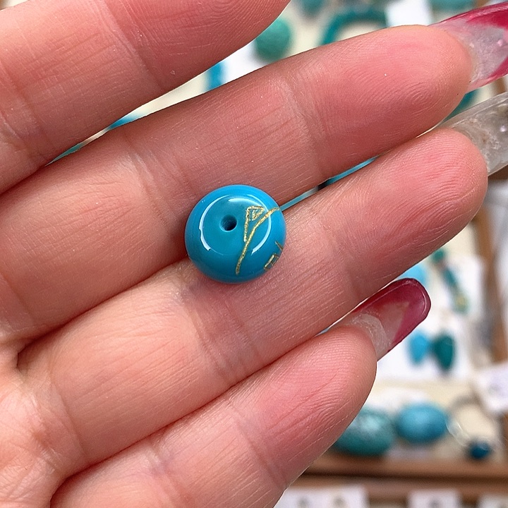 绿松石挂件未镶嵌好**绵