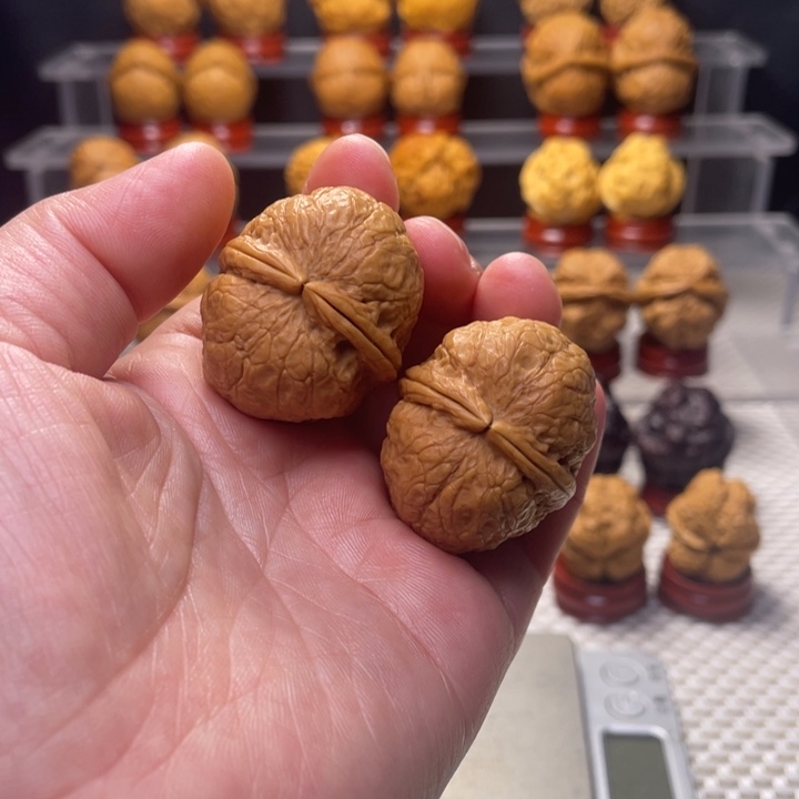 文玩核桃把件2佛陀元宝