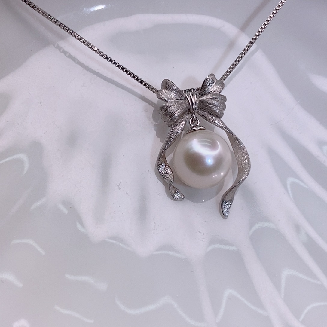 星****淡水珍珠银S925镶嵌颈饰