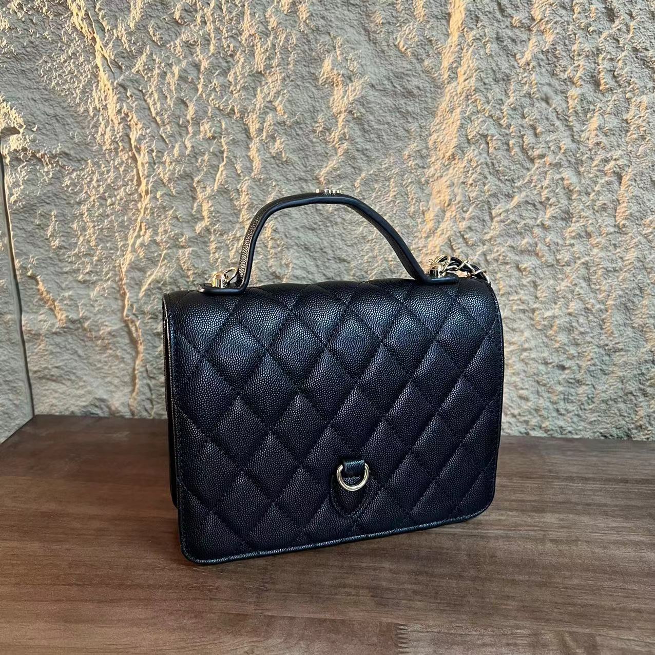 YNPO24年秋冬新款真皮重工女包酱手提小书包黑色18cm