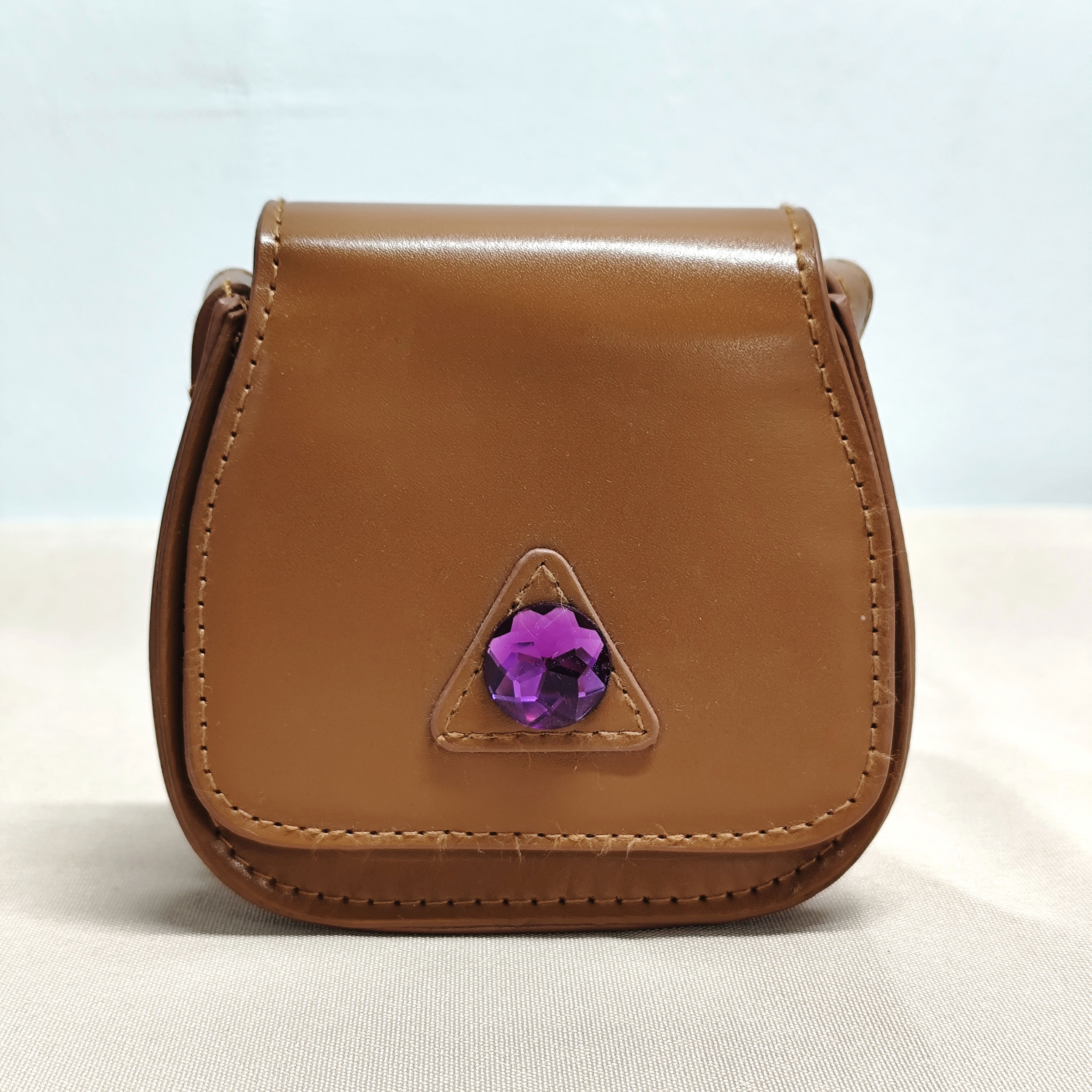 小C那个E啊~棕色斜跨化妆包推荐