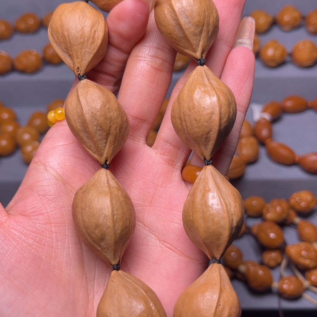 橄榄核吊坠2.1素核手持