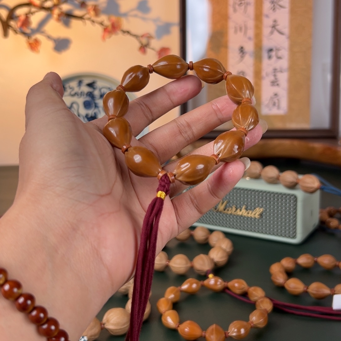 手串橄榄核16×26三面佛