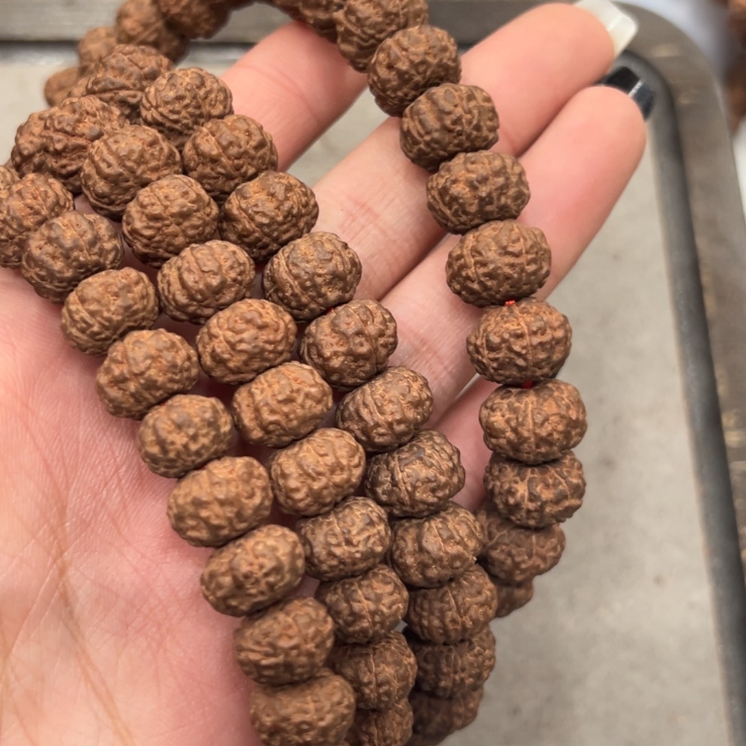 陇***客金刚菩提吊坠碟羽108