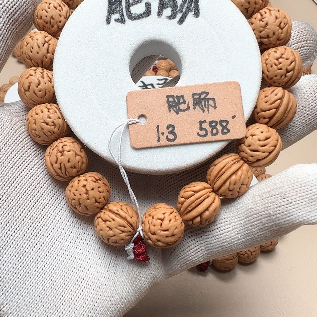 项***甘桃核手串1.3肥脐肠纹精品