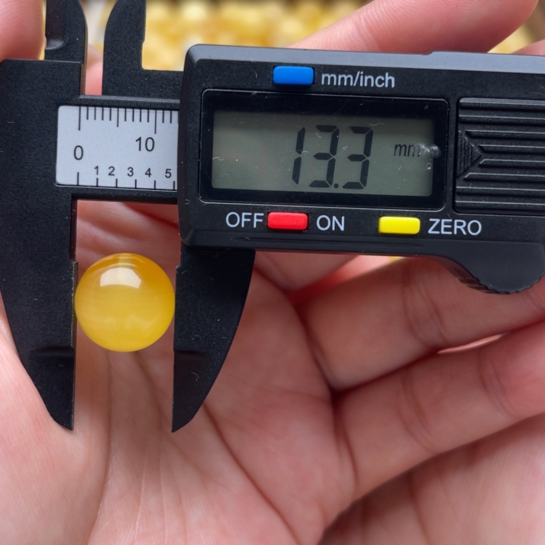 琥珀未镶嵌裸石蜜蜡圆珠笑