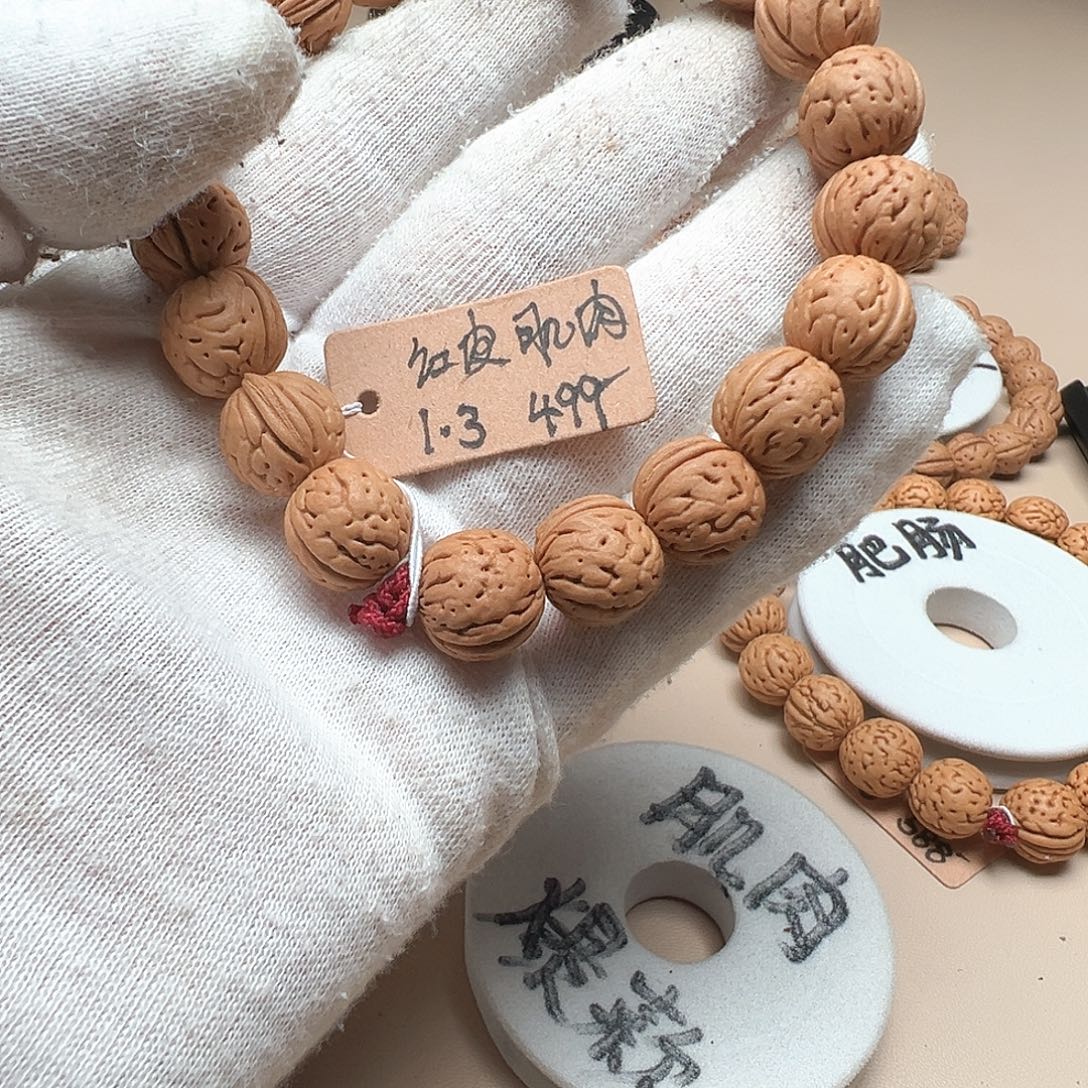 跳***4手串桃核1.3红皮大肌肉精品