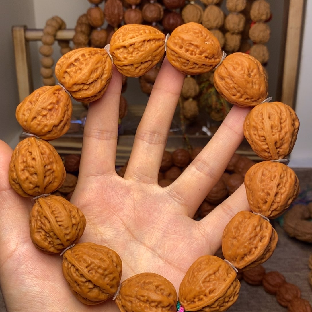 文玩核桃吊坠狮***歌绣花鞋