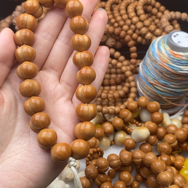 尤***）猴头核桃手串屁桃