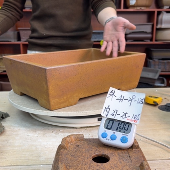 I***吐紫砂花盆里都藏满