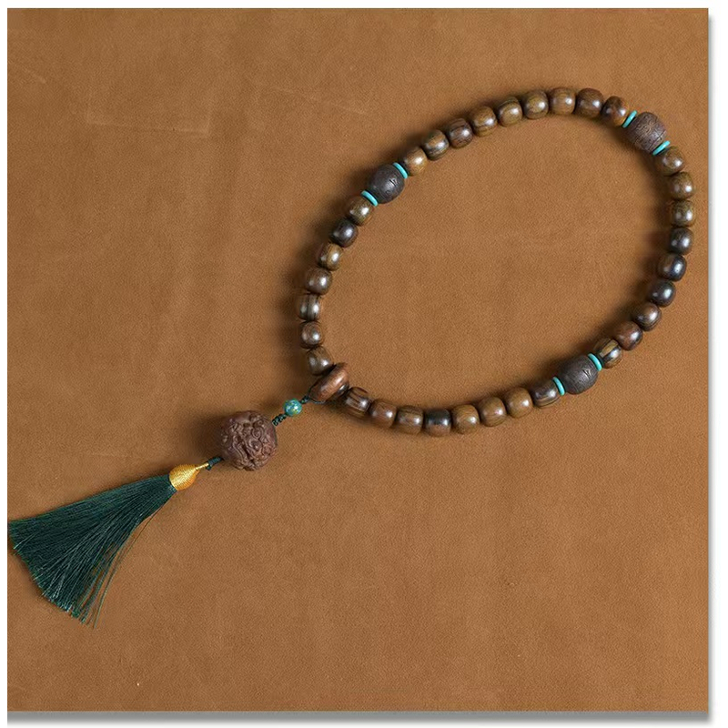 沉贵宝  缅甸黑花梨 貔貅大手持（约12mm左右）桶珠【款号236*】