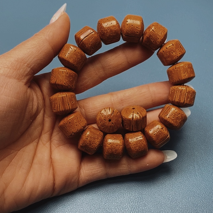 桃核手串五谷丰登16花皮色差15颗