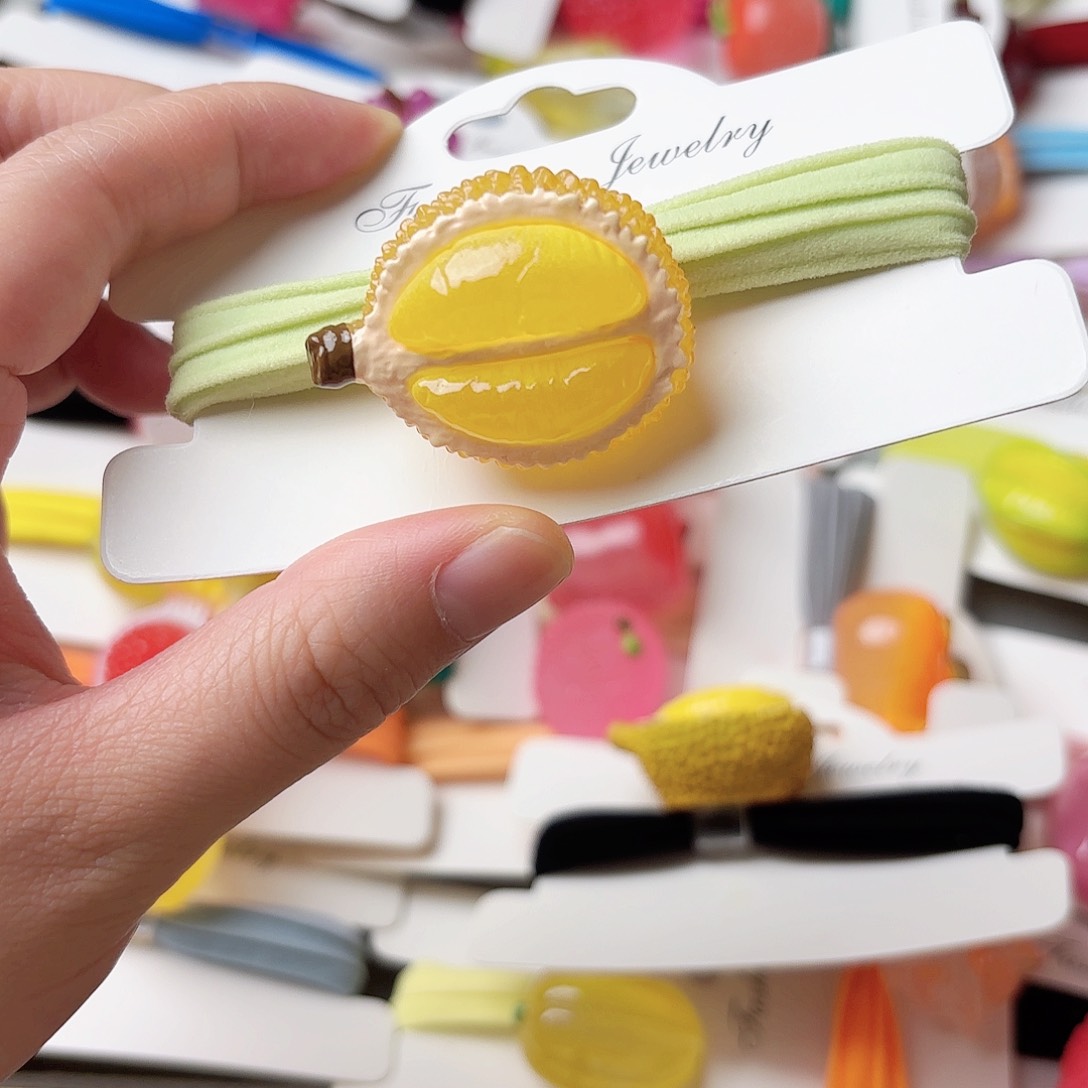 布艺非金属夜光榴莲发绳