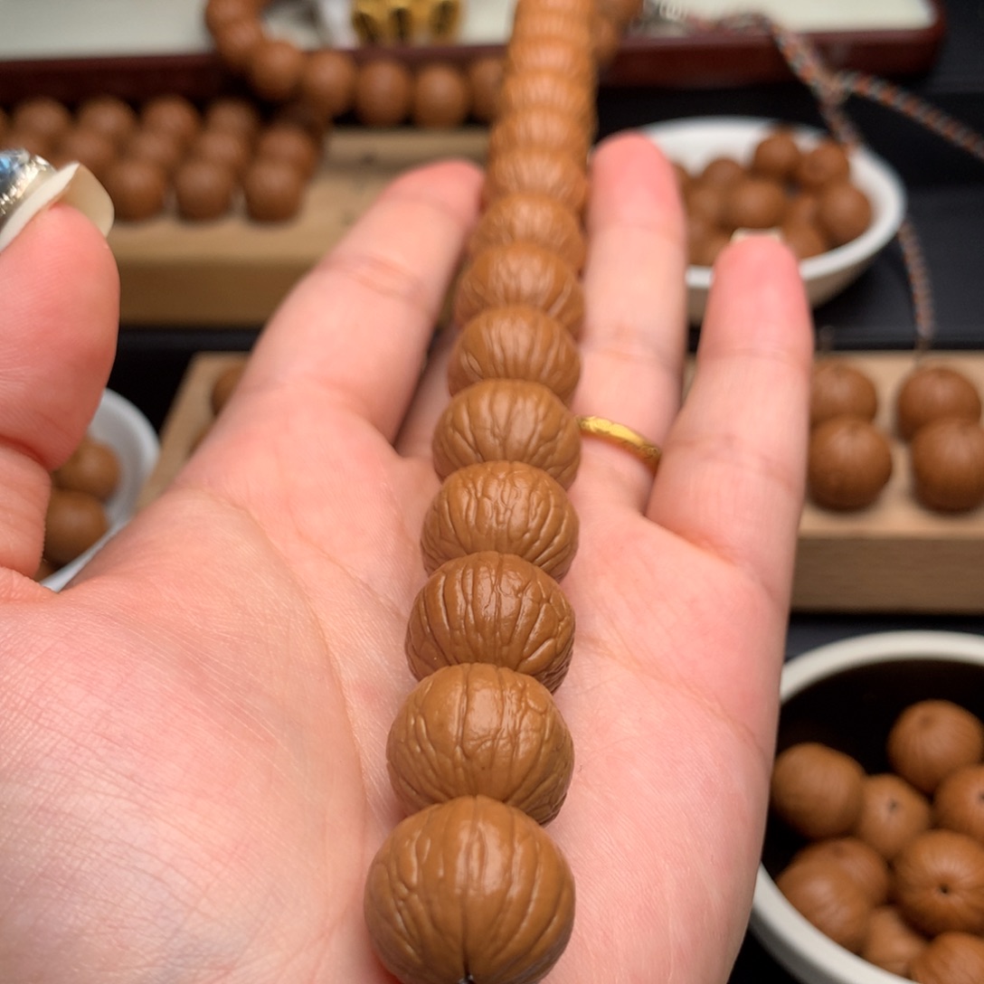 昆***酒手串猴头核桃聚宝盆