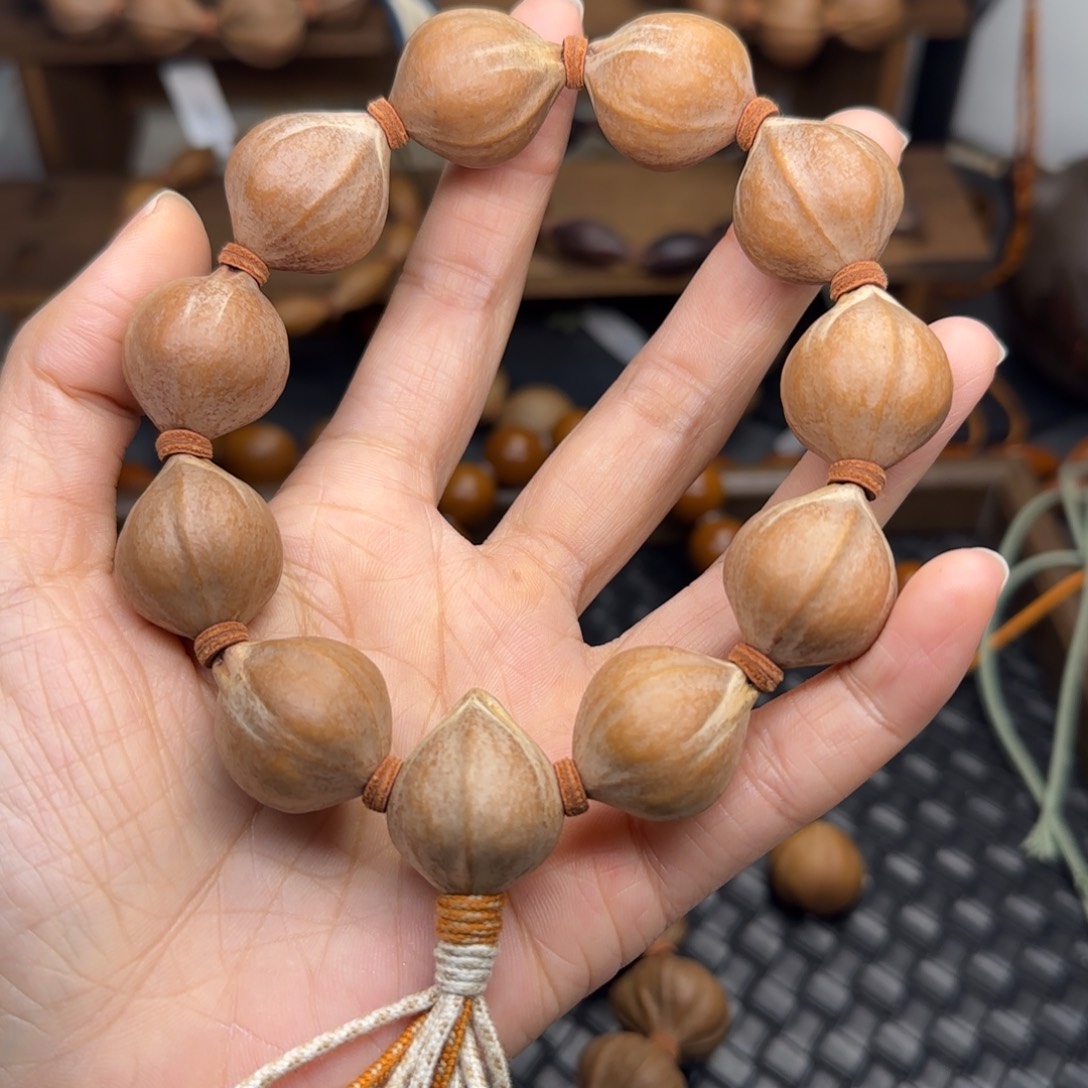 手串橄榄核07。2.0*2.5三花