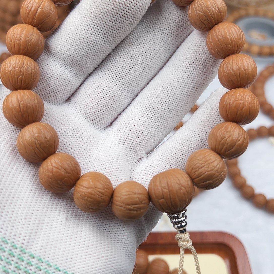 晴***️猴头核桃手串聚宝盆