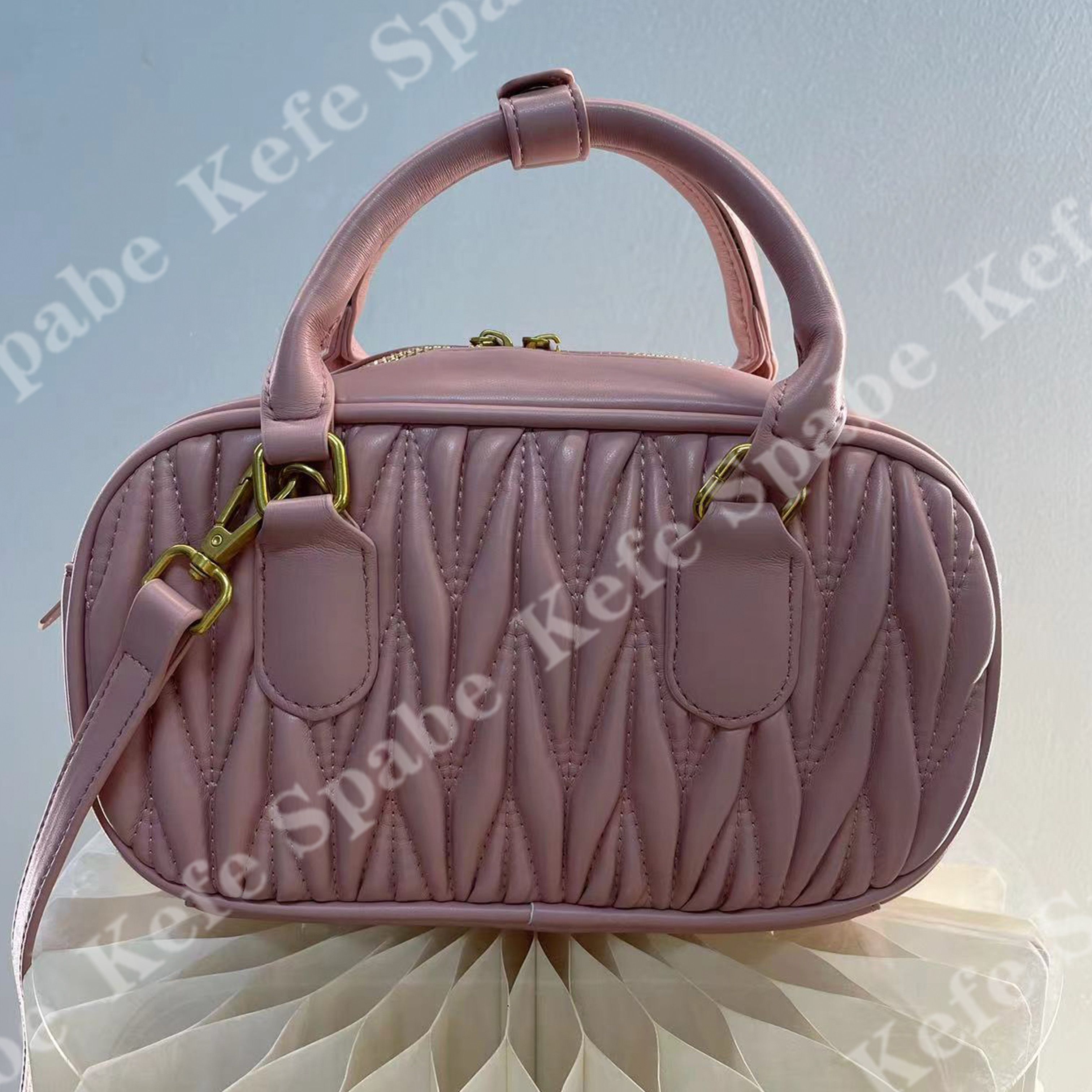 HM050  25新款粉色褶皱保龄球手提斜挎包