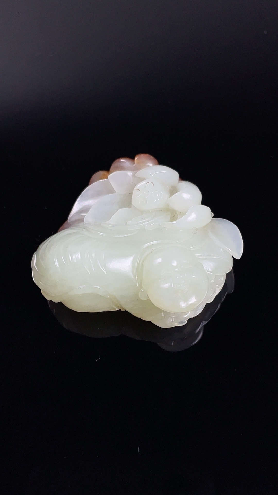 白玉红皮莲花童子