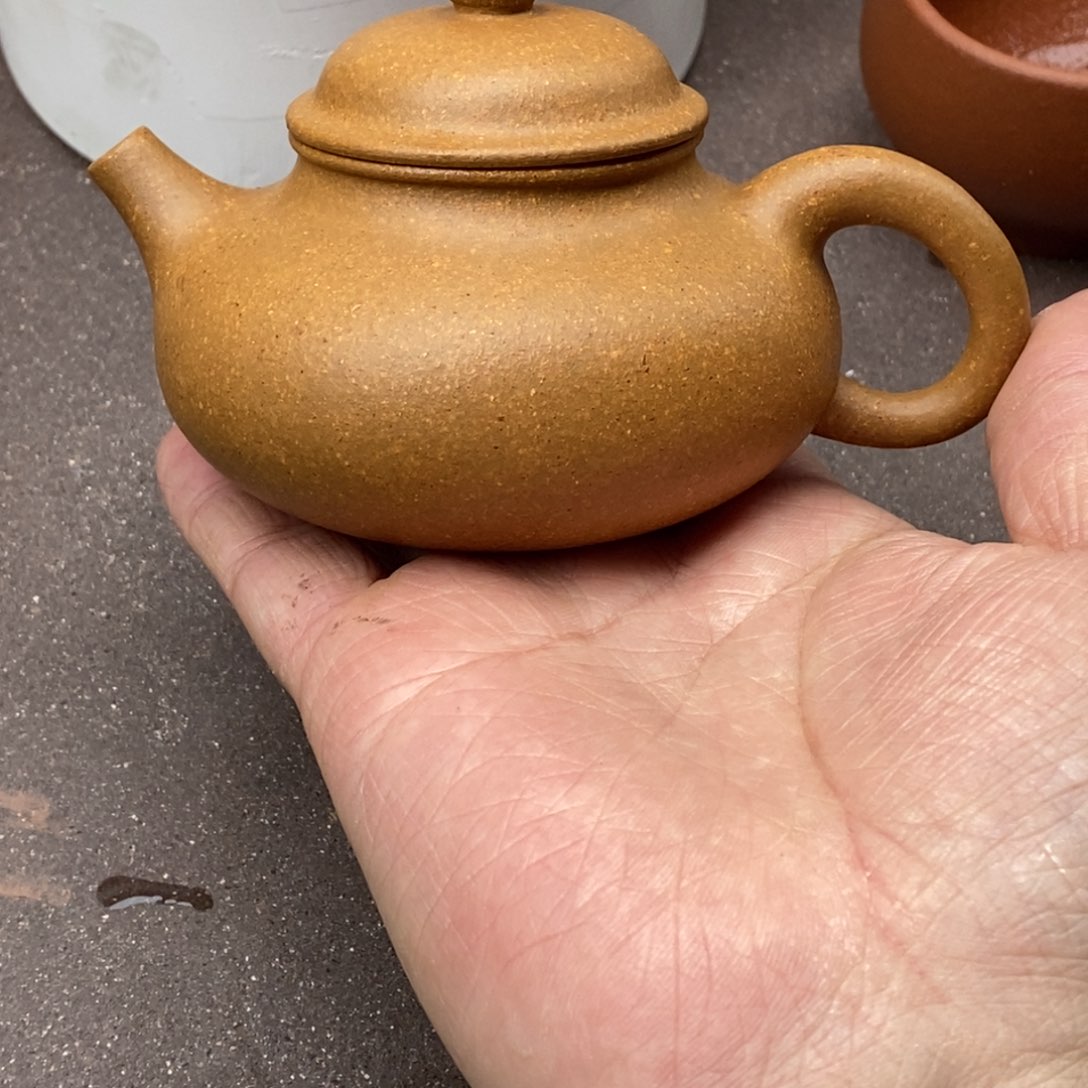 紫砂茶壶舞***?紫砂壶容天