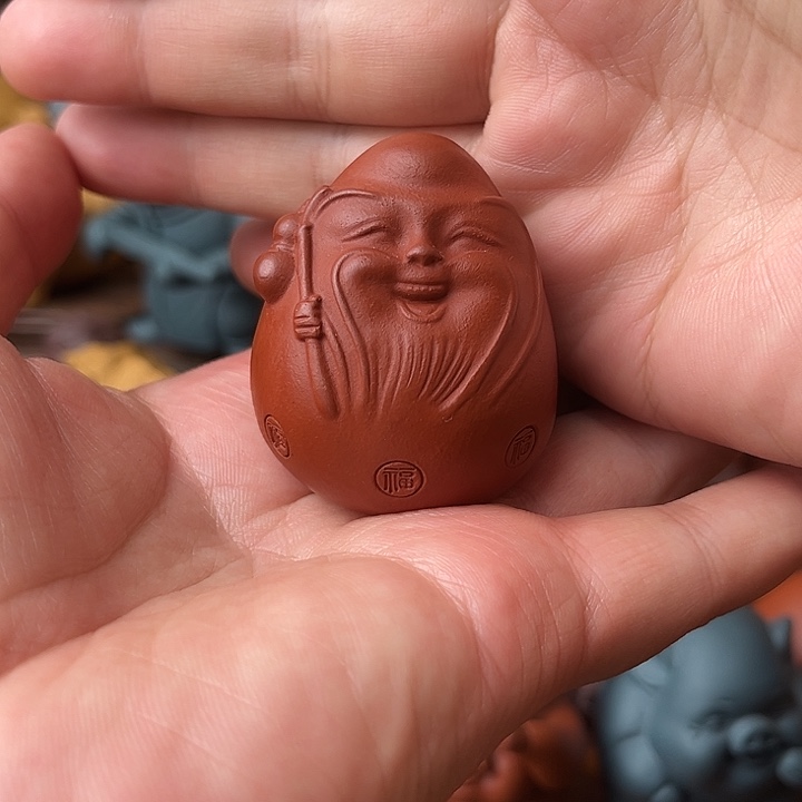 紫砂茶杯是紫砂寿星