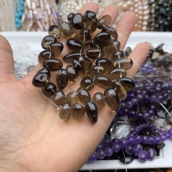 玛瑙/玉髓未镶嵌珠宝半成品一条茶晶侧孔随型