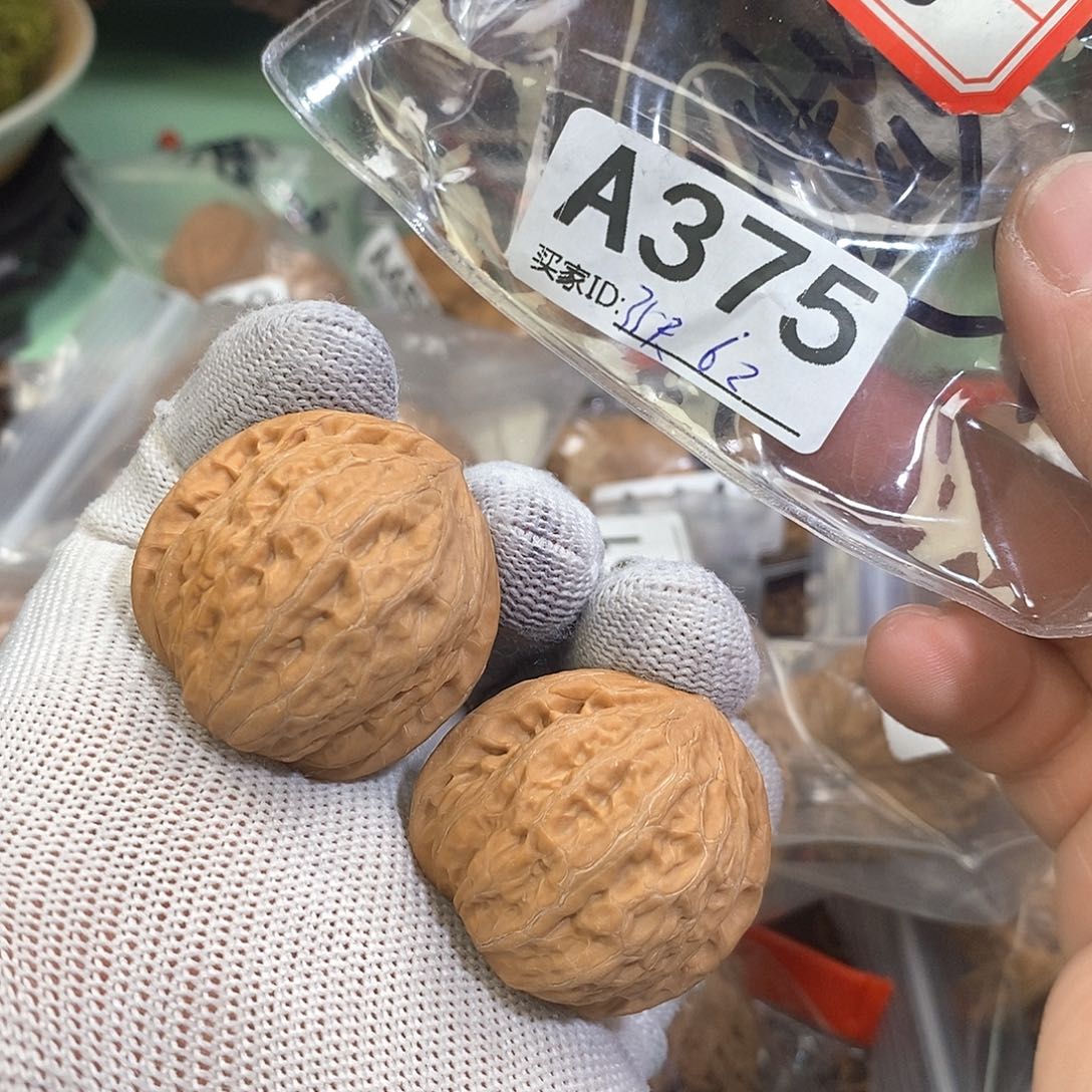 桃核把件铁锤35尺。