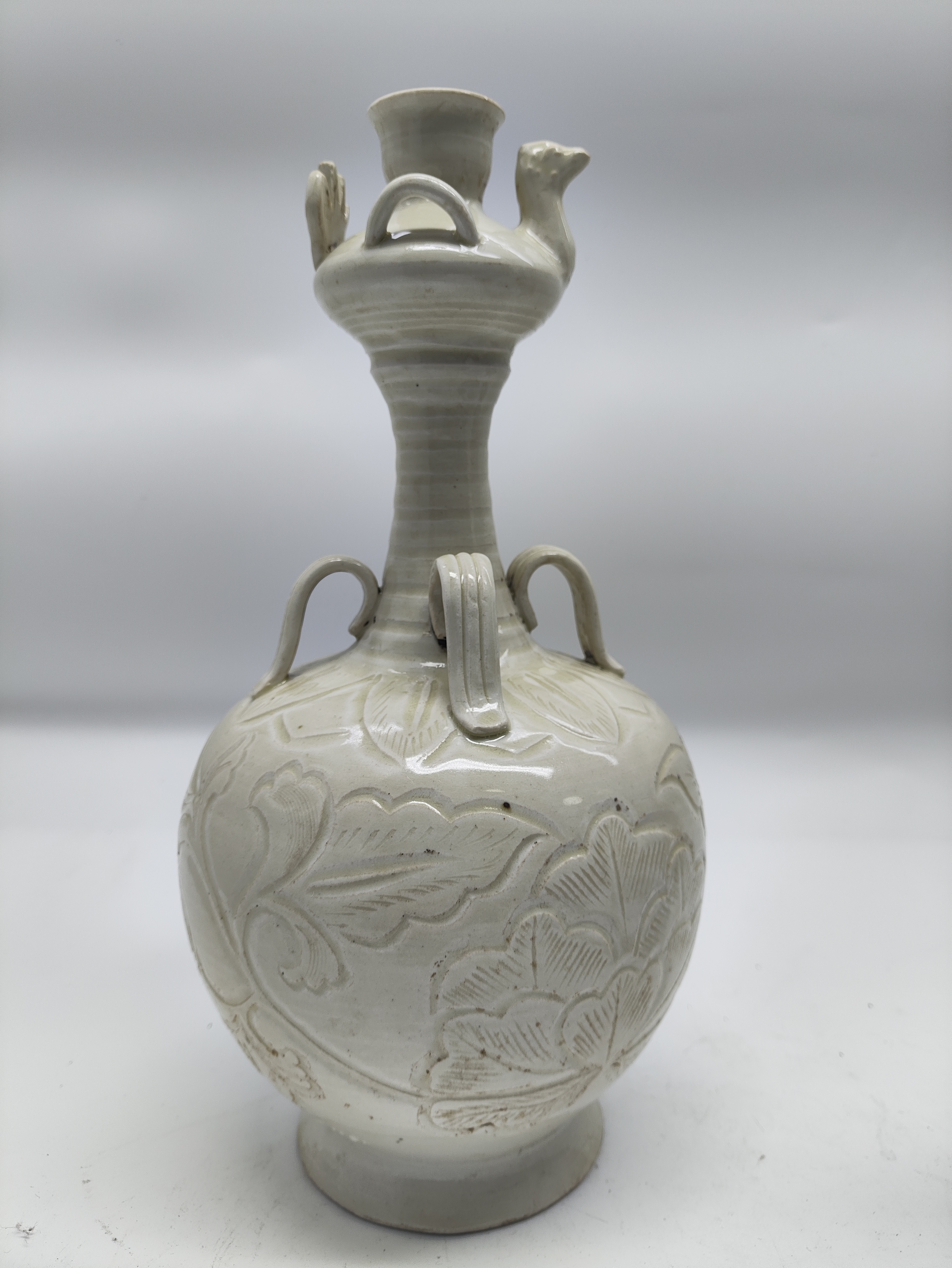 定瓷白定凤头瓶海瓷白釉