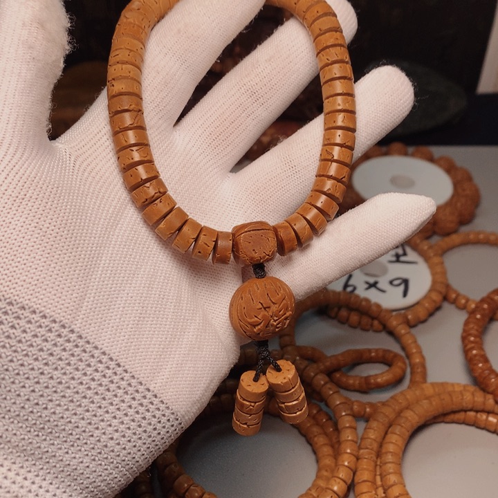 桃核吊坠不**节桃核手串持