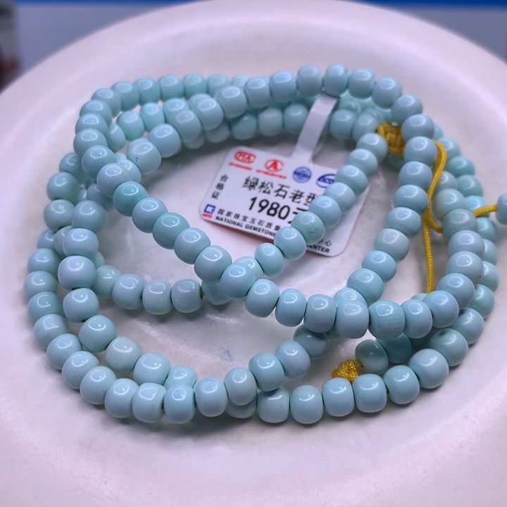 绿松石配饰未镶嵌笑***?