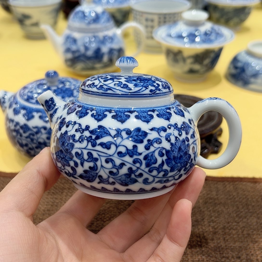 爱****?正宗紫晶柴窑缠枝莲手工壶