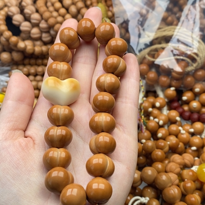 杜***狼猴头核桃手串屁桃