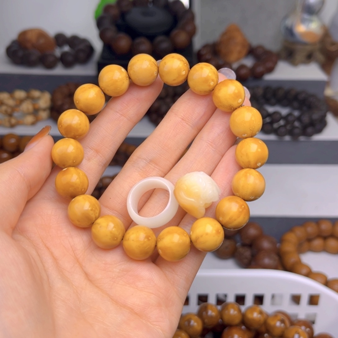 紫金鼠手串光珠差价