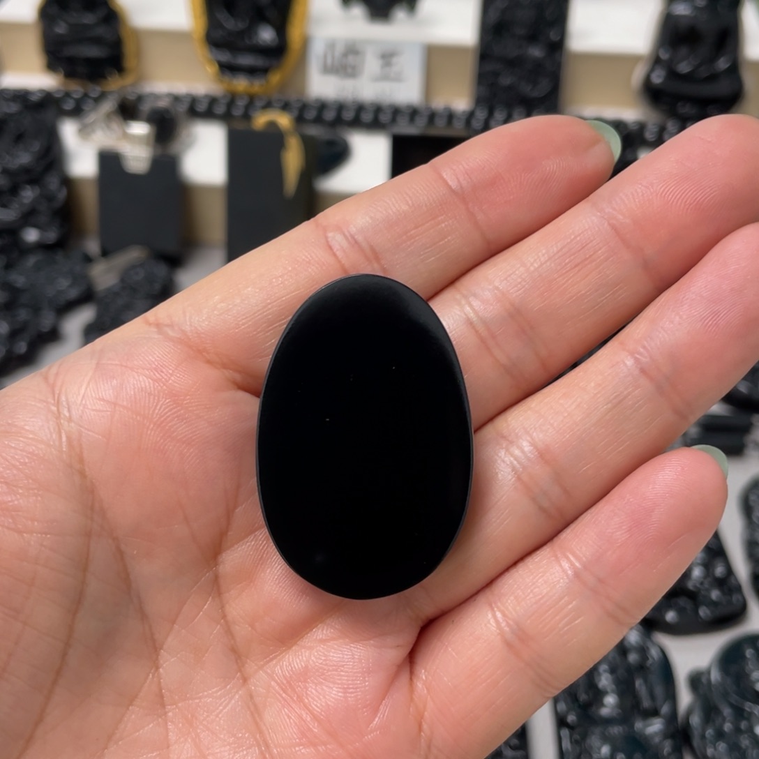 疯***们蛇纹石玉未镶嵌吊坠